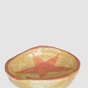 Australian-made ceramic bowl with a natural burnt glaze background and hand-painted pink stars connected in an artistic design.