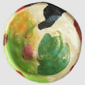 Discover the Kattu Frog Ceramic Dish, featuring a soft cream base scattered with vibrant green playful colour blobs, and a natural burning glaze. Handcrafted in Australia, perfect for trinkets, jewellery, or as a decorative accent.