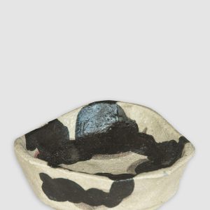 Discover the Kattu Moo Ceramic Dish, inspired by the soft, organic forms of nature, it features a striking black-and-cream pattern of interlocking cloud-like bubbles. Handcrafted in Australia, perfect for trinkets, jewellery, or as a decorative accent.