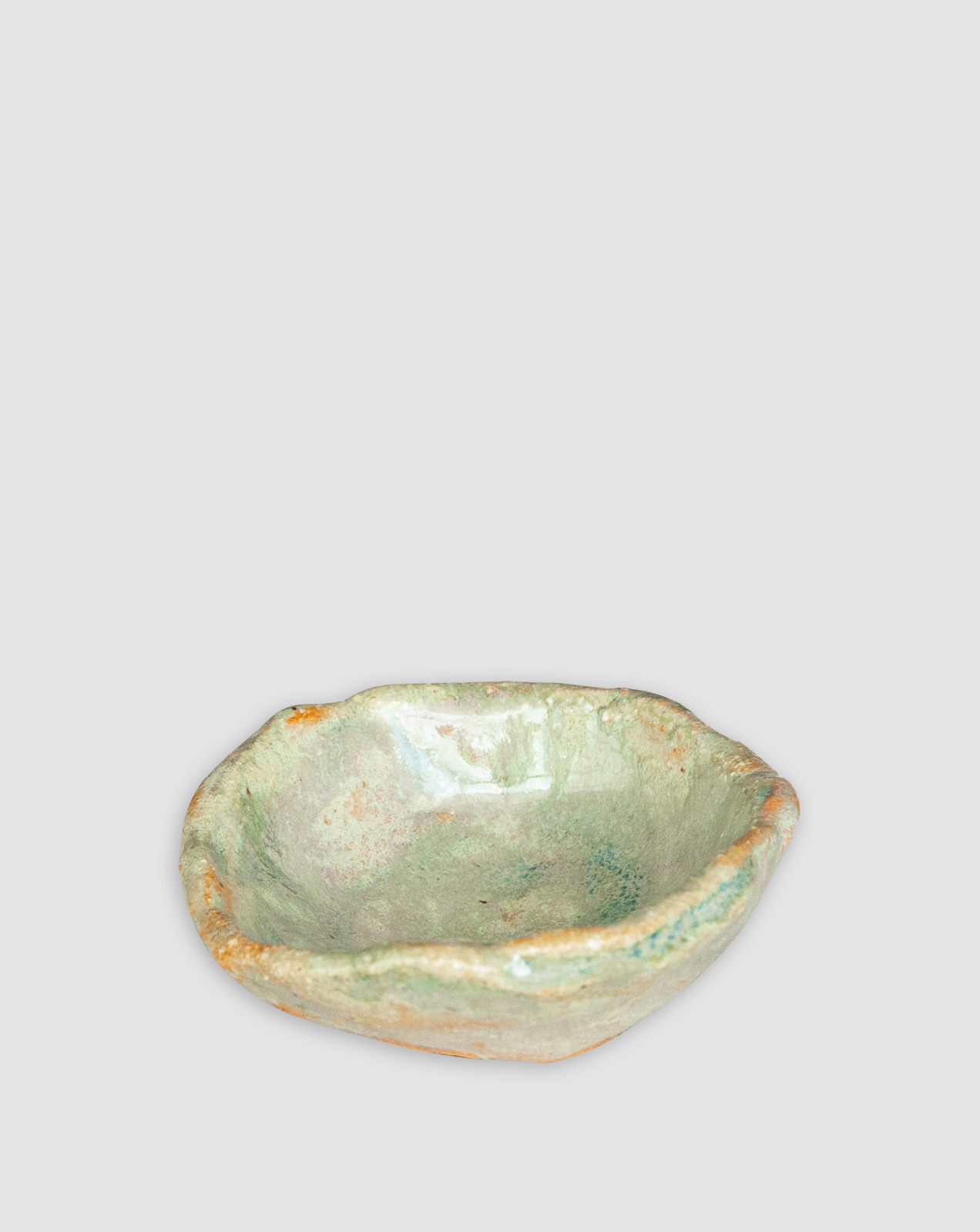 Discover the Kattu Sol Ceramic Dish, a soft swirl of blues, pinks, and warm tones layered over a smooth ceramic base, and finished with a natural burning glaze. An Australian-made small dish that brings the magic of a sunset to the palm of your hand.