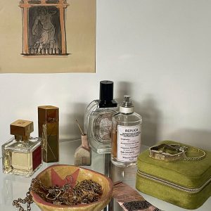 Australian-made ceramic bowl with a natural burnt glaze background and hand-painted pink stars connected in an artistic design.